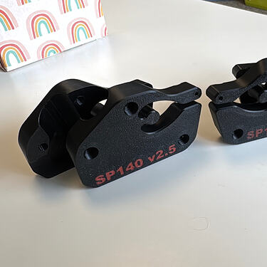 V2.5 SP140 Leg Clamps printed in Black PETG